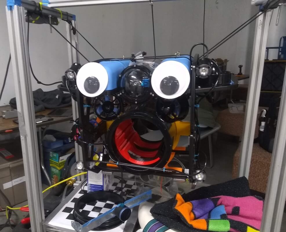 Oversized googly eyes on an aquatic robot. The front hatch is off like a gaping mouth.