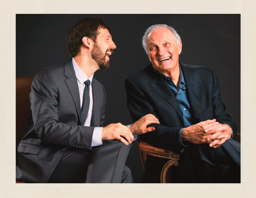 A photo of Rob sitting next to Alan Alda from the Not A Trampoline booklet.